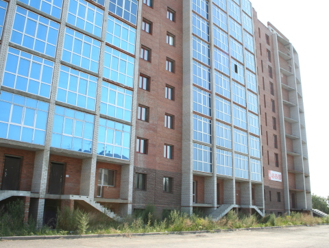 Строящийся дом на пересечении улиц Госпитальная-Октябрьская в Омске